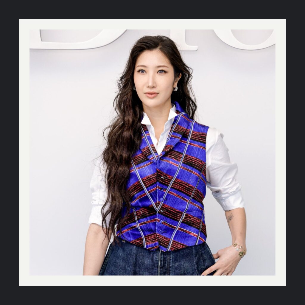 Ejae’s soft, feminine hairstyle with alternating Nu Waves and Lived-in Waves at Dior Paris Fashion Week