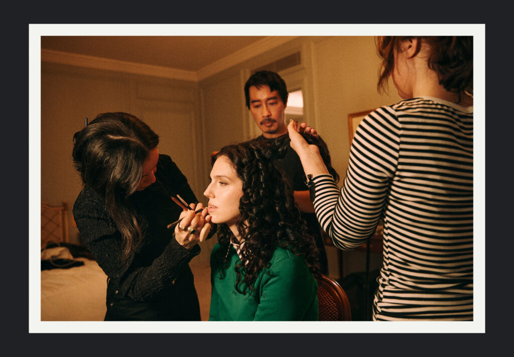 Natural, textured curls styled by Anh Co Tran for Eva Victor at Loewe runway Paris Fashion Week