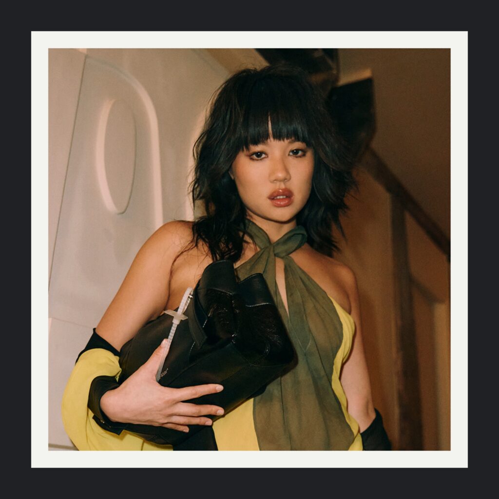 Paris Fashion Week hairstyle with blunt bangs and textured waves