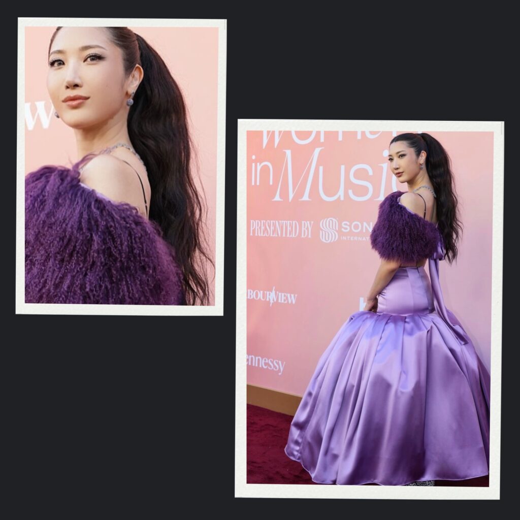 Detailed view of Ejae’s voluminous ponytail hairstyle on the red carpet