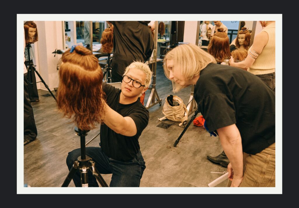 Curated Cutting Educator Daniel Kim providing hands-on guidance in class